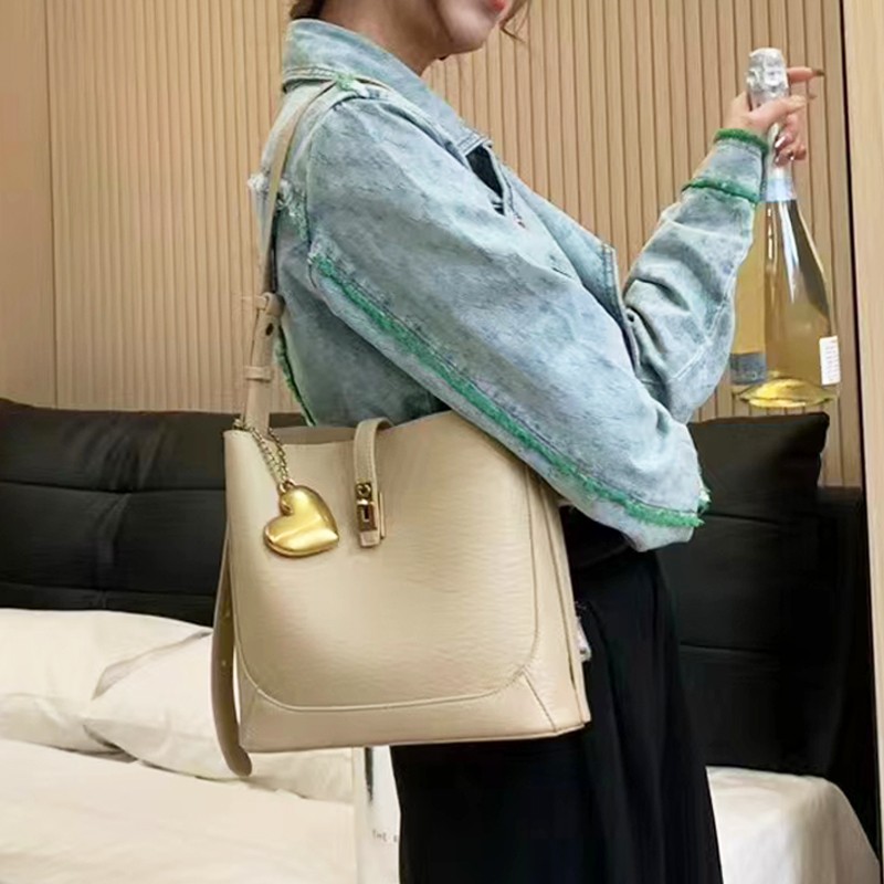 MEL JUN Niche design commuter bucket bag female simple atmosphere advanced sense fashion casual all shoulder crossbody bag