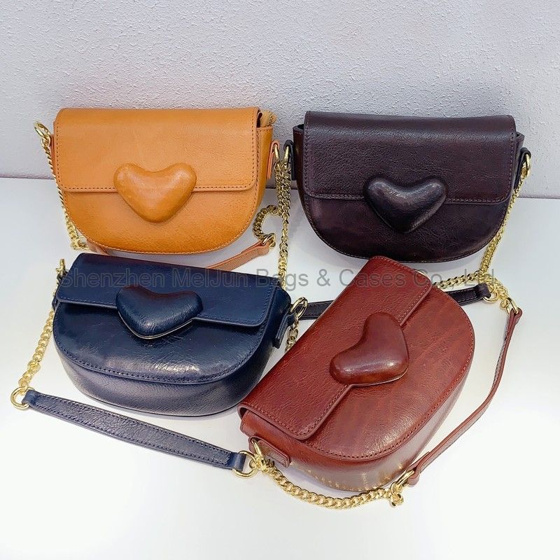 MEL JUN New Genuine leather women's bag Heart-shaped all-matching women's bag Niche design Single shoulder crossbody women's bag chain women's saddle bag