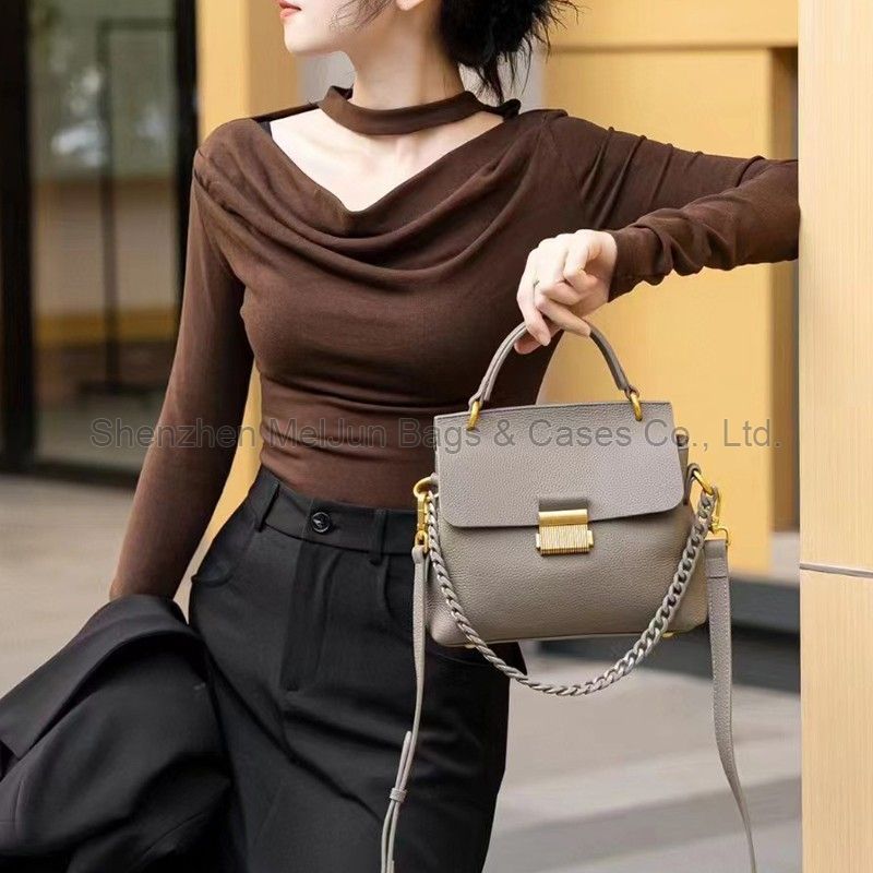 MEL JUN 2024 new leather clamshell Kelly bag niche design fashion simple locking hand bill shoulder oblique span female bag fashion